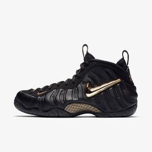 Black/metallic gold nike air foampositespro